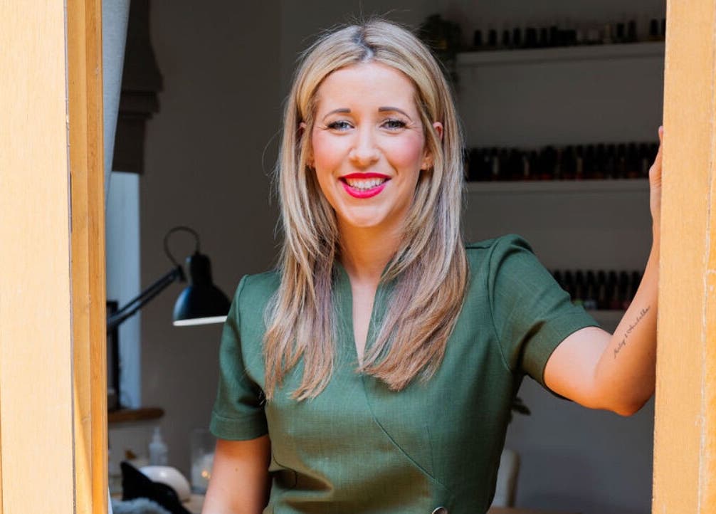 A smiling person at Practically Perfect in Every Way, Tewin, England, GB, standing in a doorway.