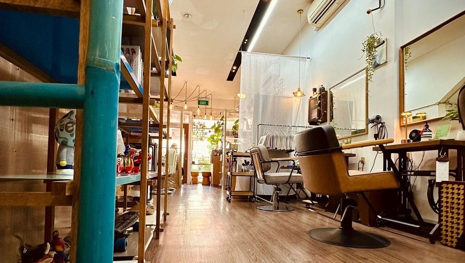 Cozy and stylish interior of Salon5 in Singapore, Singapore, SG featuring modern chairs and decor.