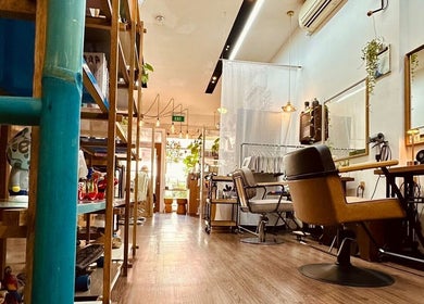 Cozy and stylish interior of Salon5 in Singapore, Singapore, SG featuring modern chairs and decor.