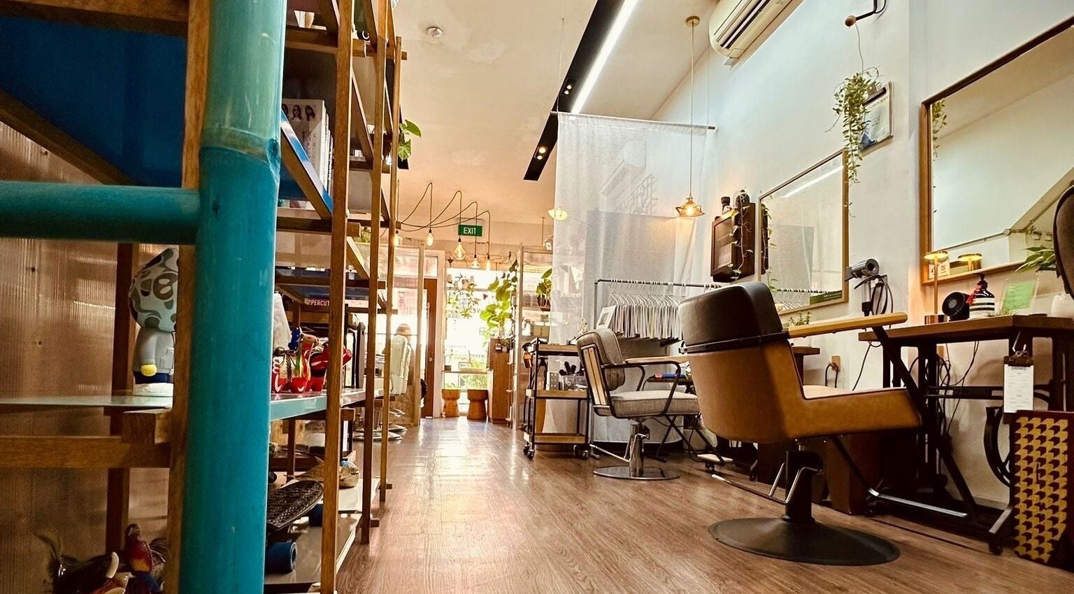 Cozy and stylish interior of Salon5 in Singapore, Singapore, SG featuring modern chairs and decor.