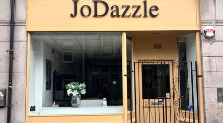 Front of Joanne at 𝑱𝒐𝑫𝒂𝒛𝒛𝒍𝒆 in Aberdeen, Scotland, GB with a stylish glass storefront.