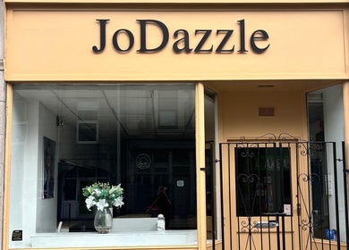 Front view of Joanne at Jo Dazzle beauty salon in Aberdeen, Scotland, GB with elegant window display.