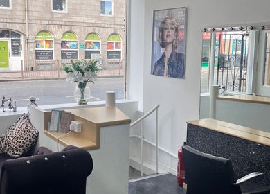Stylish interior of Joanne at Jo Dazzle, Aberdeen, Scotland, GB with modern decor and comfortable seating.