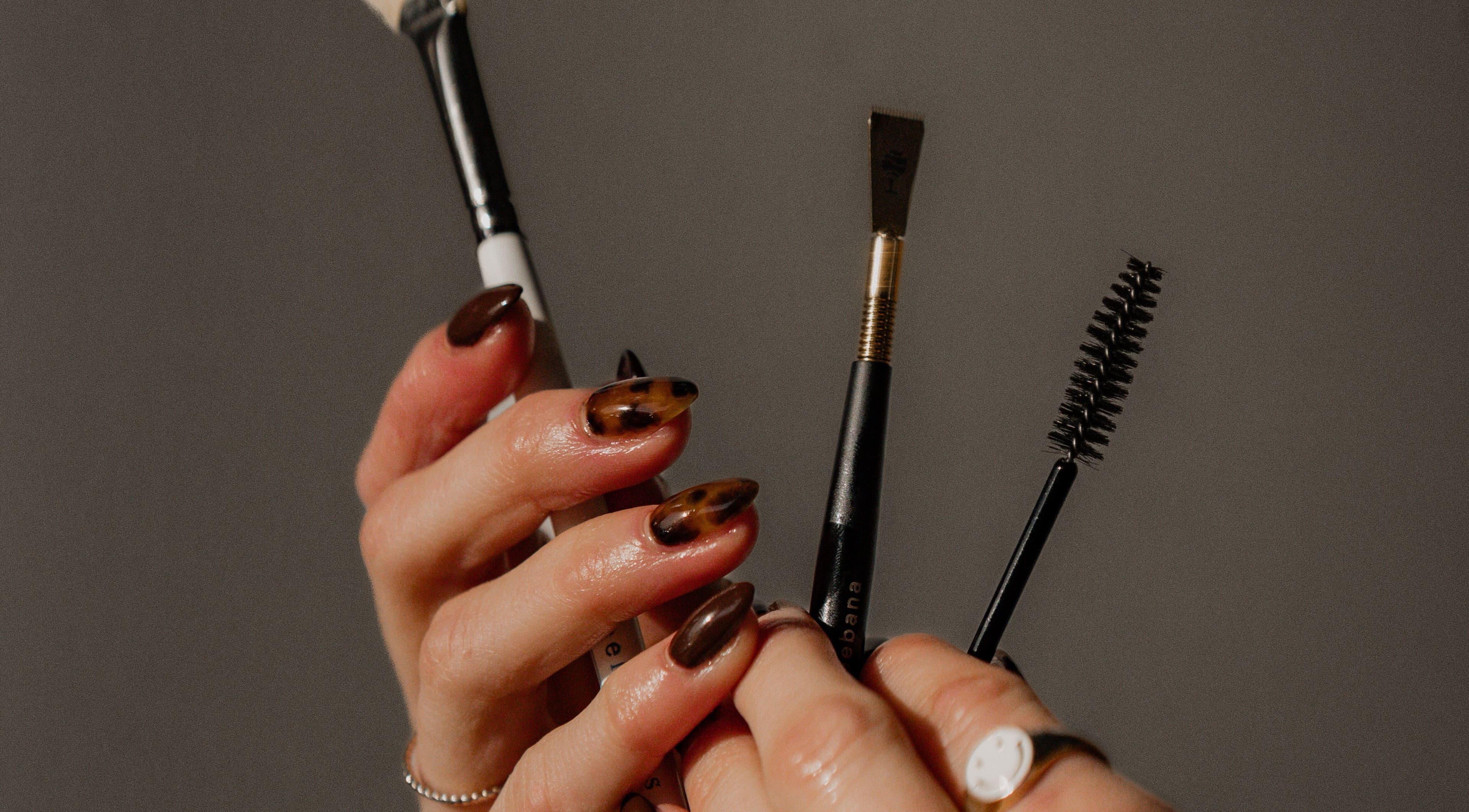 Close-up of manicure tools at Tiny Luxury Spa in Winkler, Manitoba, CA showcasing elegant nail art.