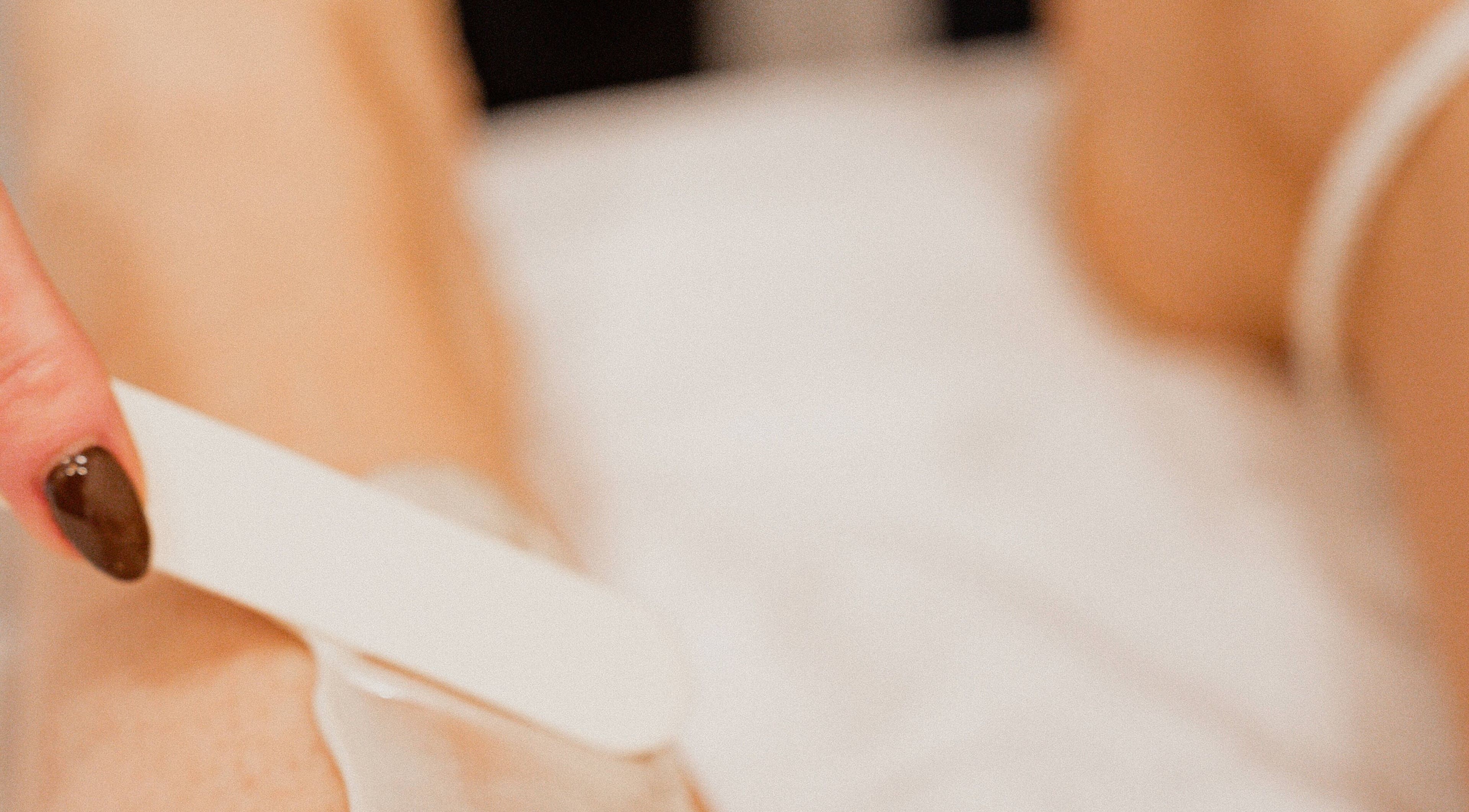 Professional waxing service at Tiny Luxury Spa in Winkler, Manitoba, CA, offering a gentle touch.