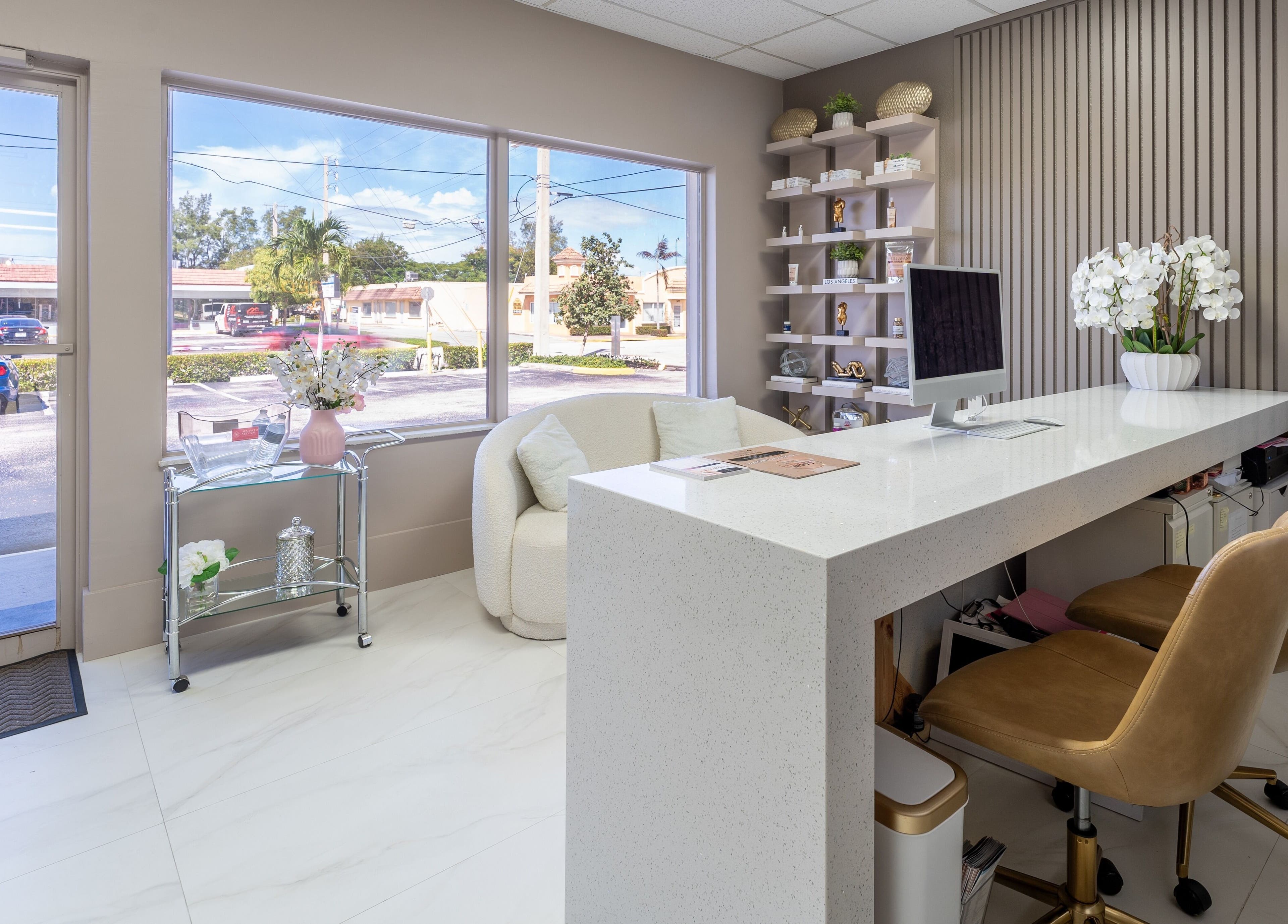 Reception area at Advanced Med SPA - Deerfield Beach, featuring modern decor and seating in Deerfield Beach, Florida, US.