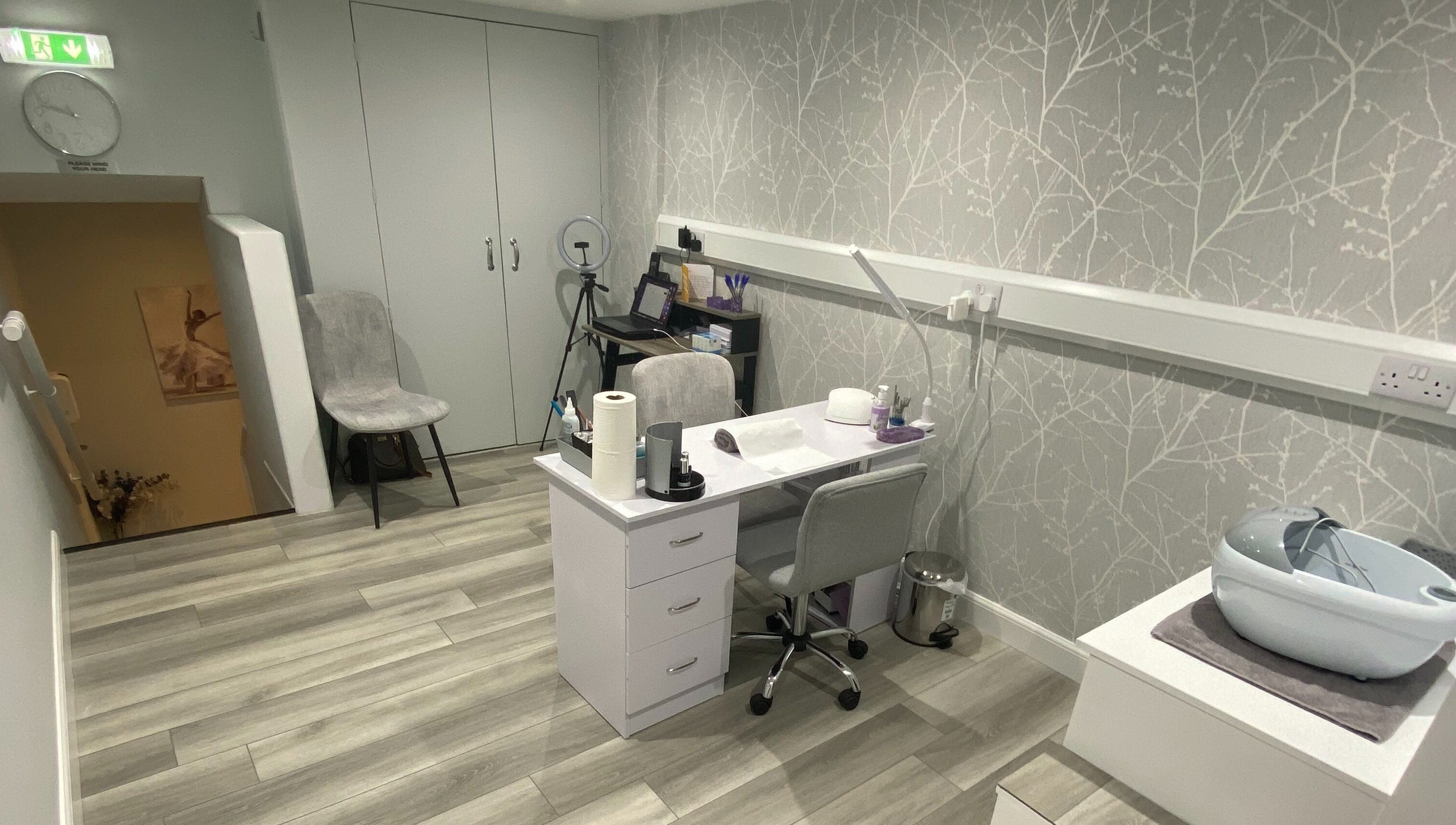 Modern therapy room at Sara Campbell Therapies, Inverness, Scotland, GB, featuring a sleek desk and stylish decor.