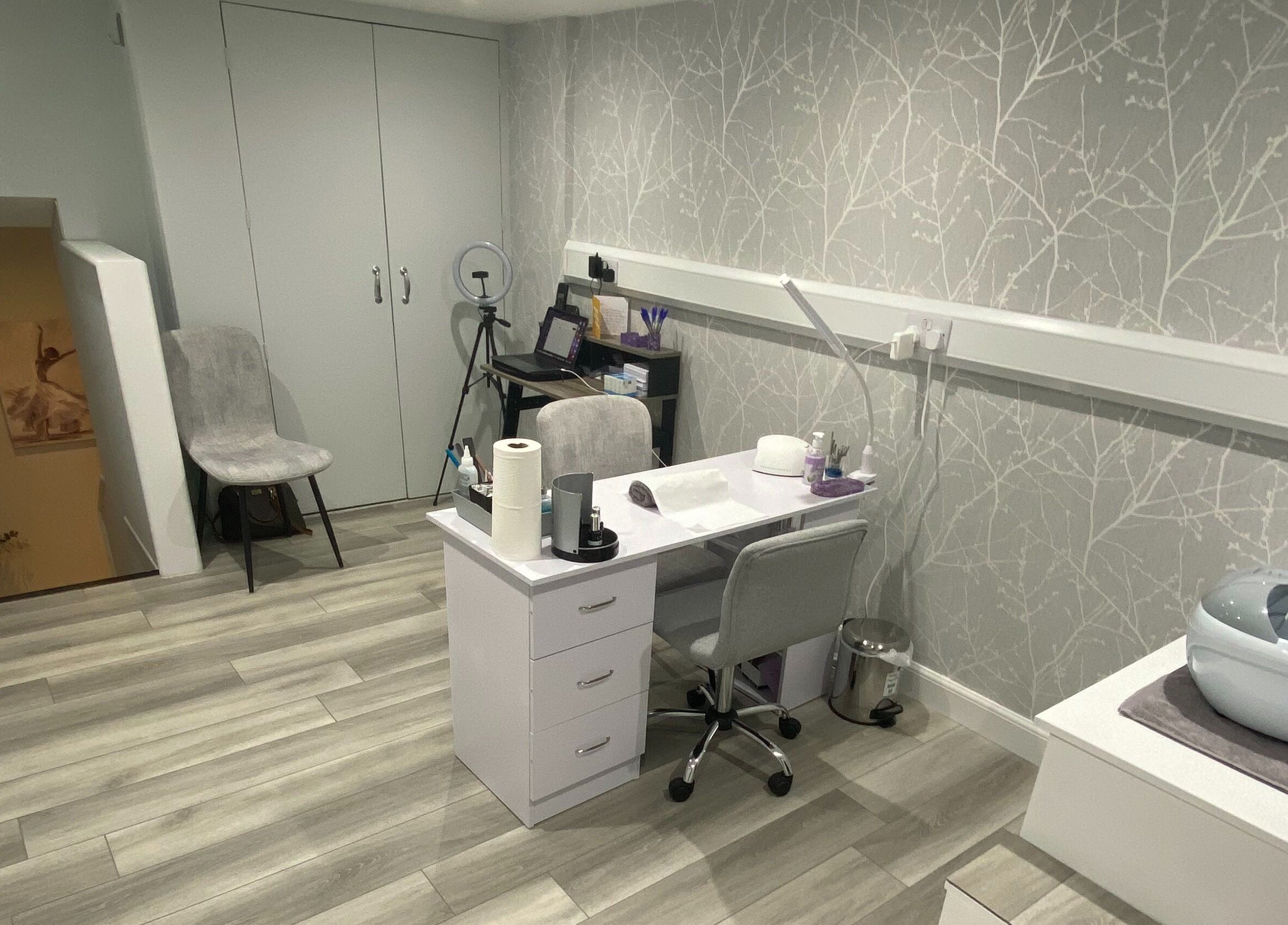 Modern therapy room at Sara Campbell Therapies, Inverness, Scotland, GB, featuring a sleek desk and stylish decor.