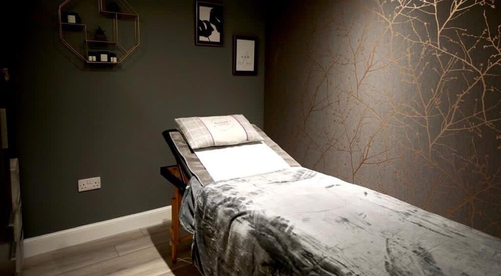 Cozy massage room at Sara Campbell Therapies in Inverness, Scotland, GB with plush table and serene decor.
