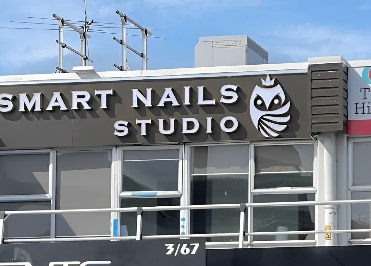 Exterior of Smart Nails Studio in Auckland, Auckland, NZ featuring bold signage and modern design.