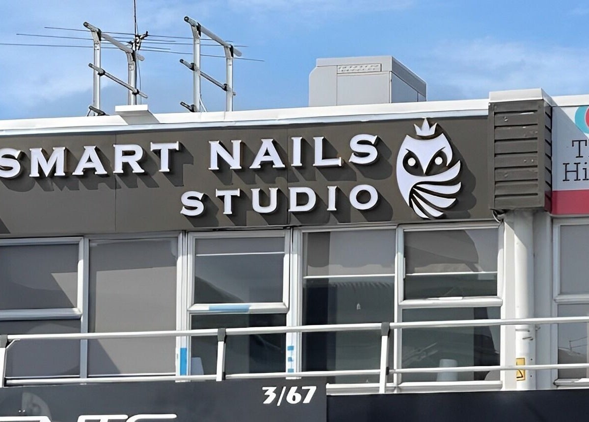 Exterior of Smart Nails Studio in Auckland, Auckland, NZ featuring bold signage and modern design.