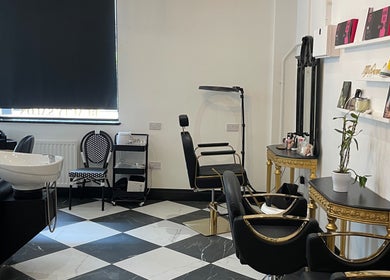 Elegant interior of Confidence & Glow Aesthetics in Morley, England, GB, featuring luxury styling chairs and decor.