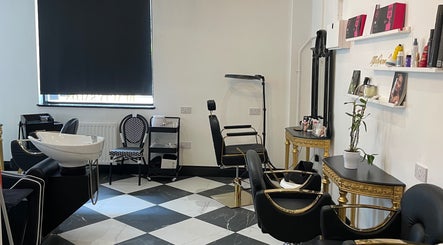 Elegant interior of Confidence & Glow Aesthetics in Morley, England, GB, featuring luxury styling chairs and decor.