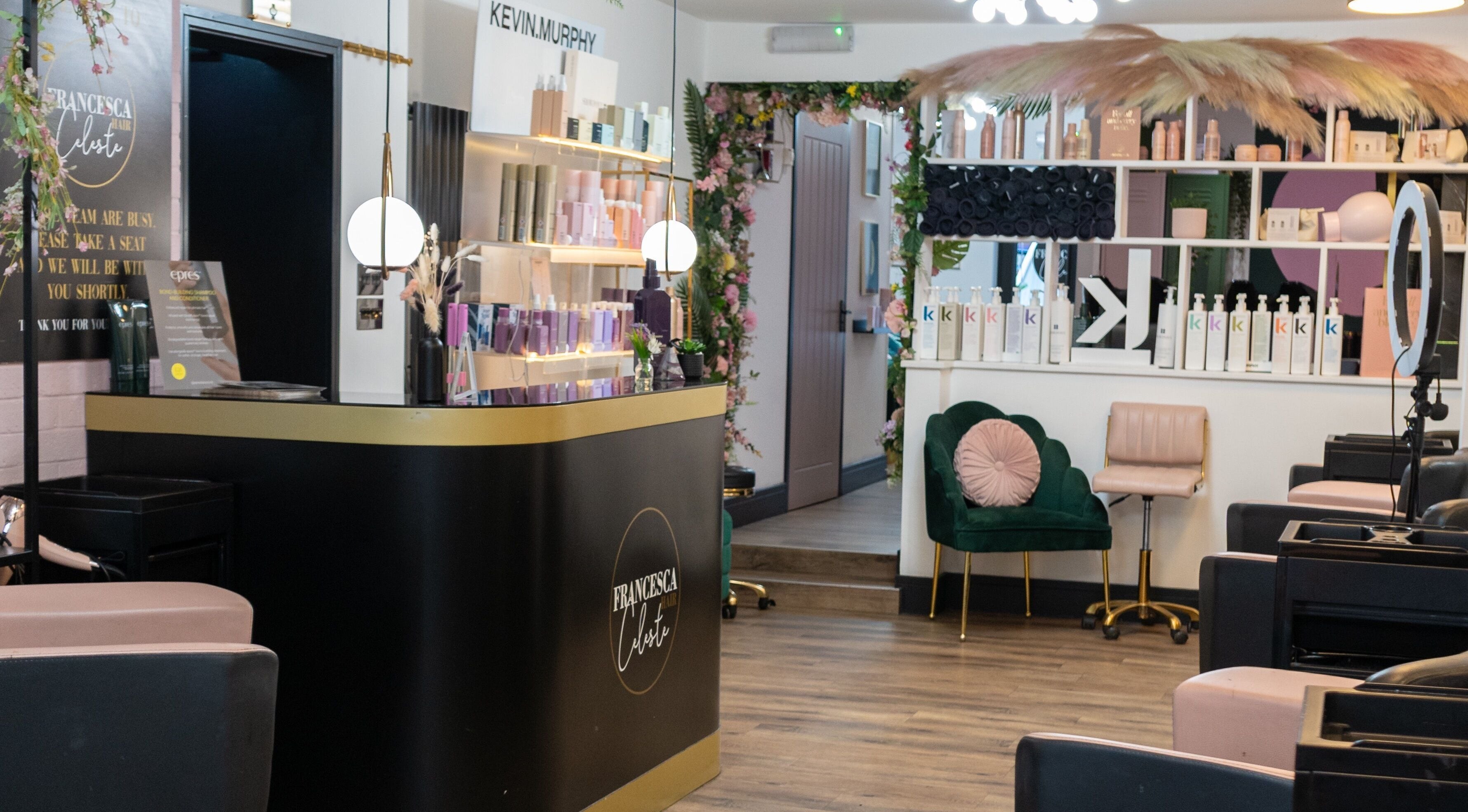 Modern interior of Francesca Celeste hair salon in Kidderminster, England, GB featuring elegant decor and styling products.