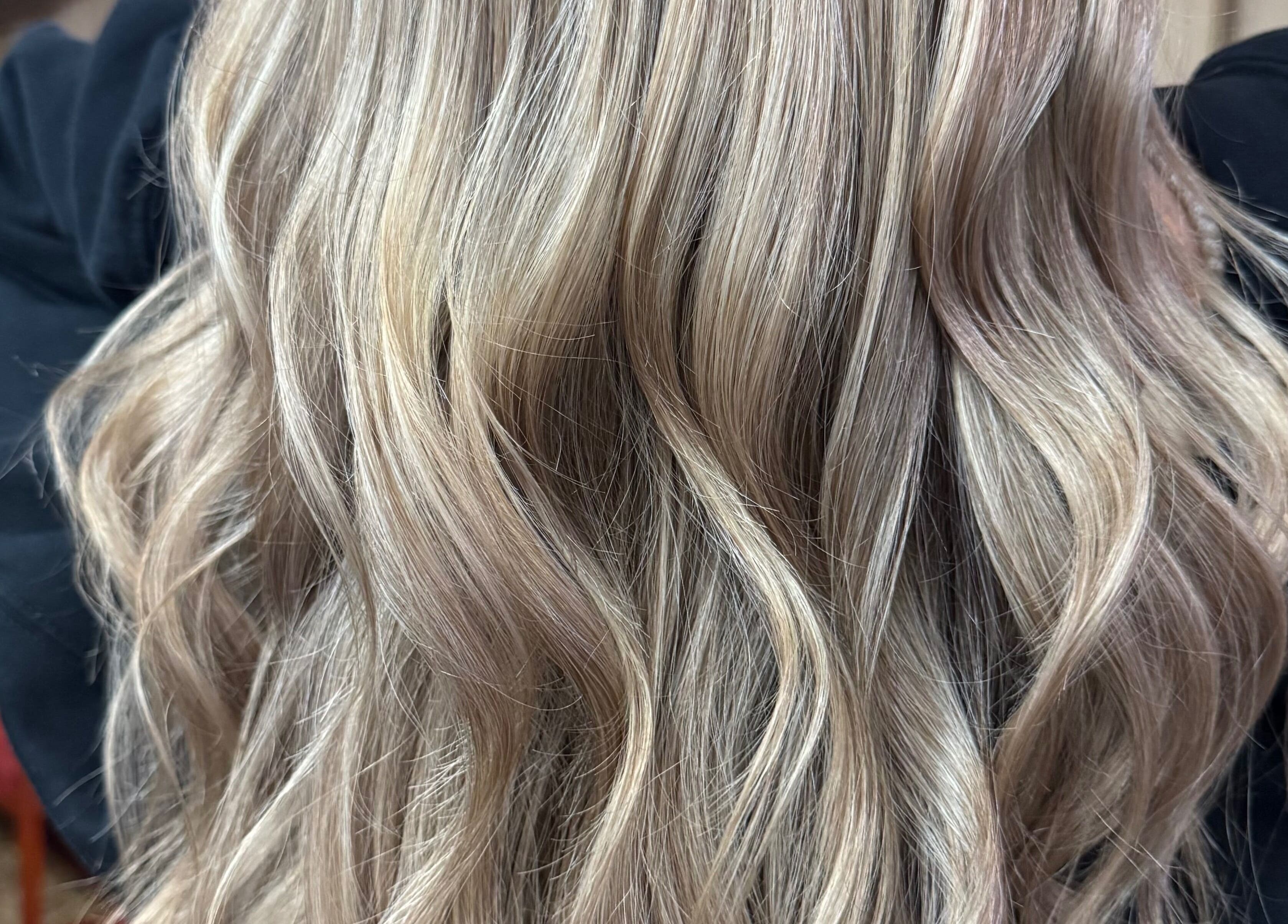 Silky blonde waves styled at The Cutting Post, Tannersville, Pennsylvania, US.