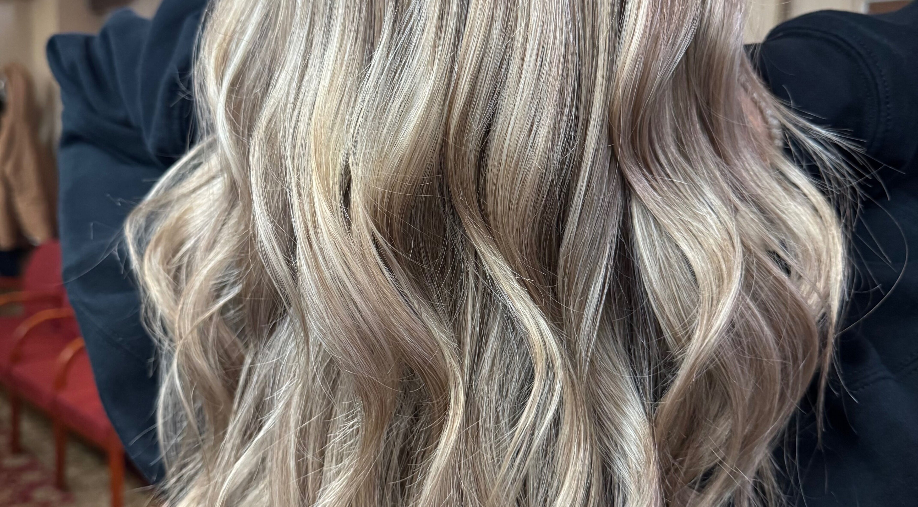 Silky blonde waves styled at The Cutting Post, Tannersville, Pennsylvania, US.