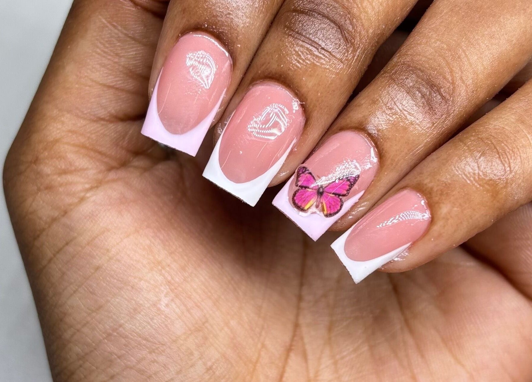 Pink and white butterfly nail art at Mimi's Nails, Port of Spain, Charlotte St, TT.