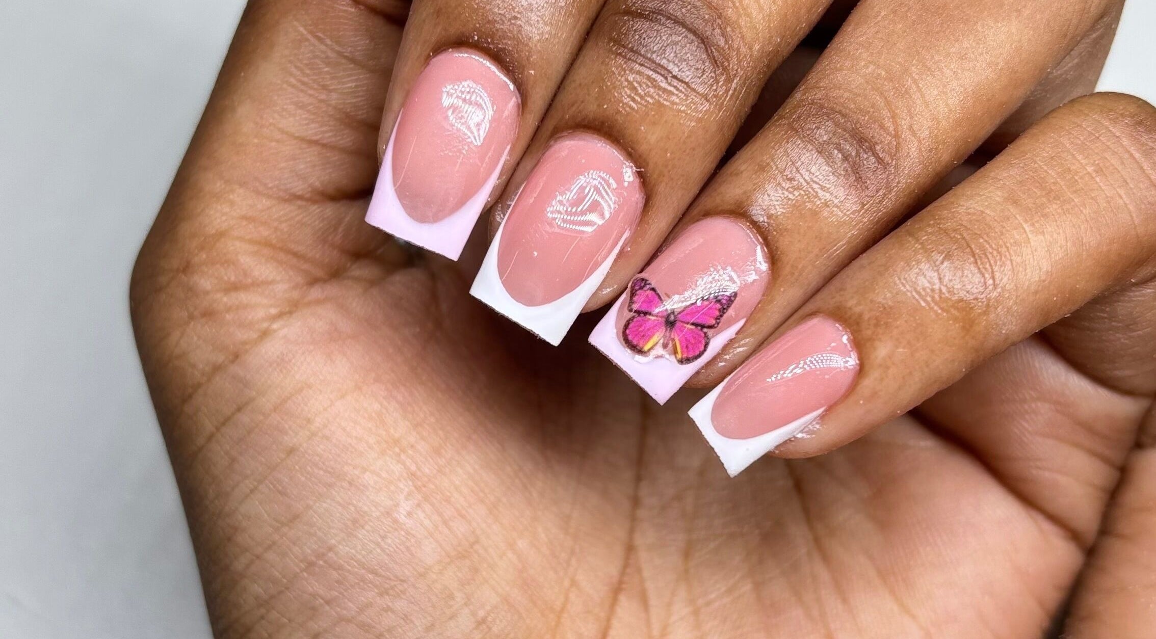 Pink and white butterfly nail art at Mimi's Nails, Port of Spain, Charlotte St, TT.