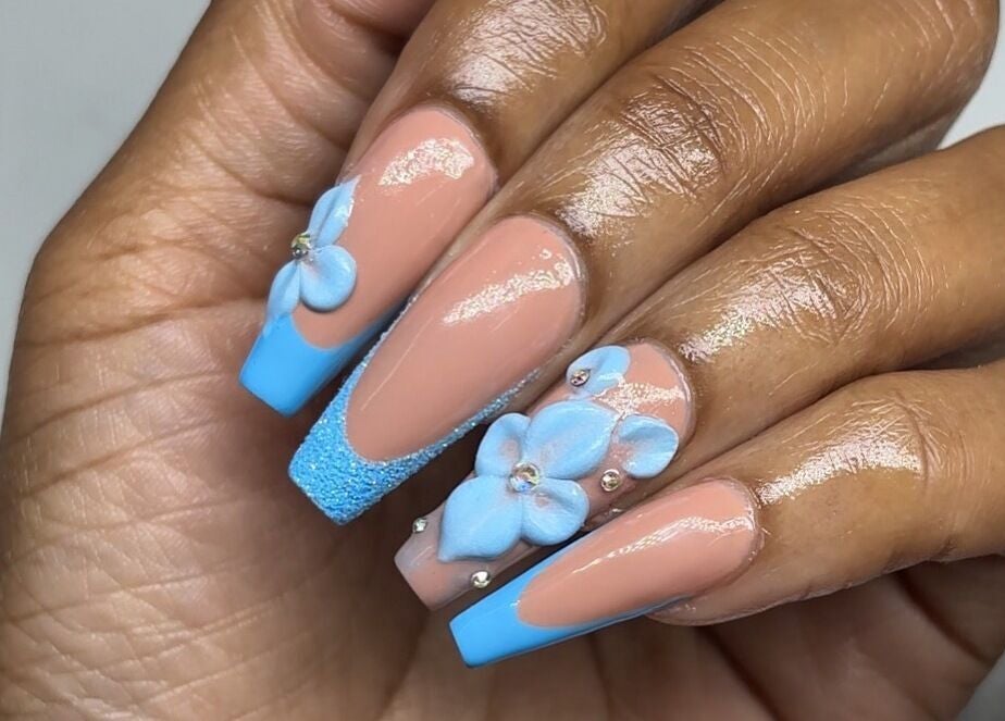 Elegant blue floral nail art at Mimi's Nails, Port of Spain, Charlotte St, TT.
