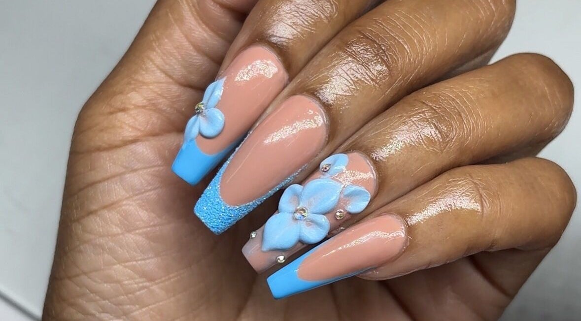 Elegant blue floral nail art at Mimi's Nails, Port of Spain, Charlotte St, TT.