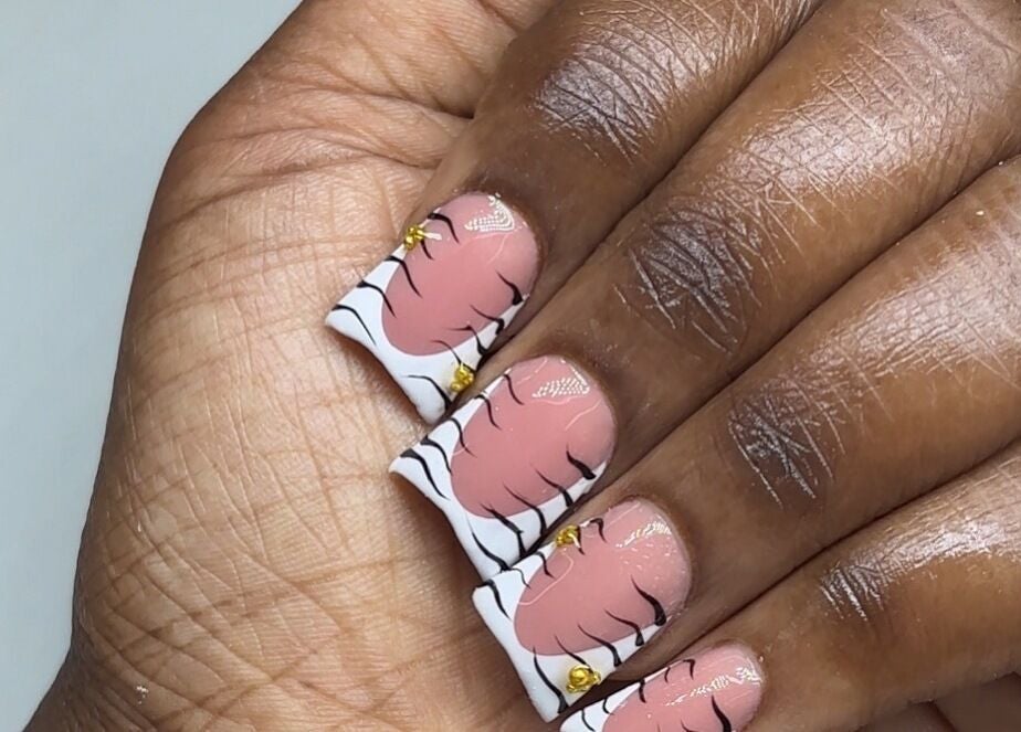 Elegant nail design at Mimi's Nails, Port of Spain, Charlotte St, TT. Stunning look and expert care.