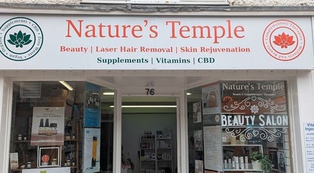 Front view of Nature's Temple Beauty in Sudbury, England, GB showcasing the salon and signage.