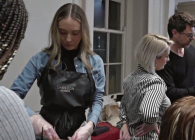 Stylists at Barry Alan Hair Salon perfecting hair in Norwich, England, GB.