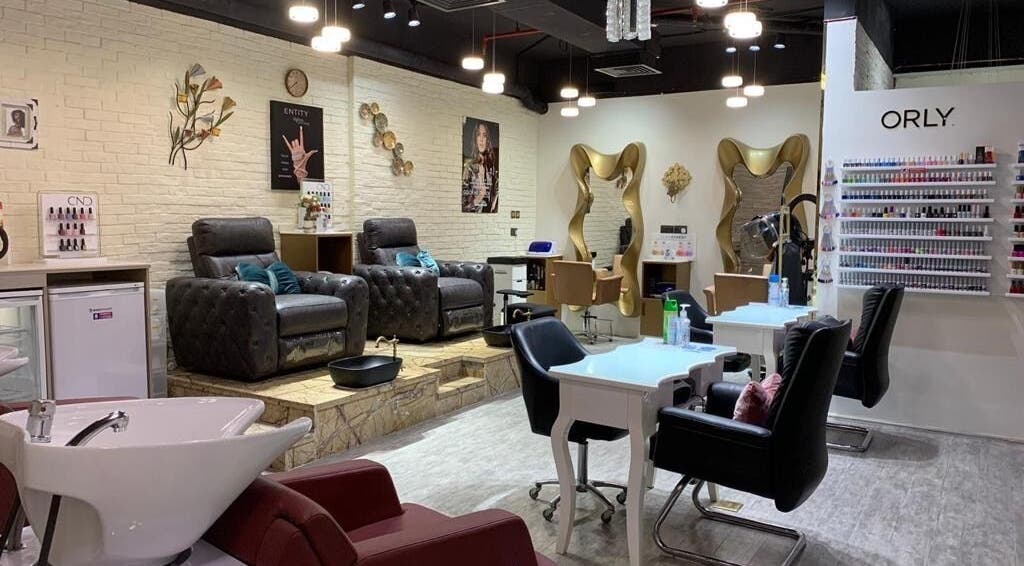Luxurious seating area inside Elle Beauté Ladies Salon, Dubai, AE, showcasing elegant and modern decor.