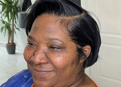 Client with a chic hairstyle at Innovative Salon | Hair & Beauty, London, England, GB.