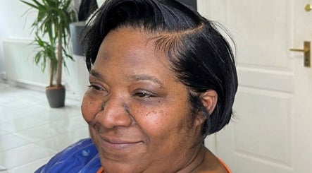 Client with a chic hairstyle at Innovative Salon | Hair & Beauty, London, England, GB.