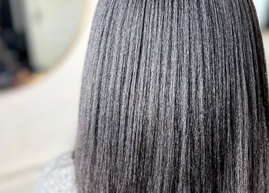 Sleek, shiny hair at Innovative Salon | Hair & Beauty, London, England, GB, showcasing expert styling.