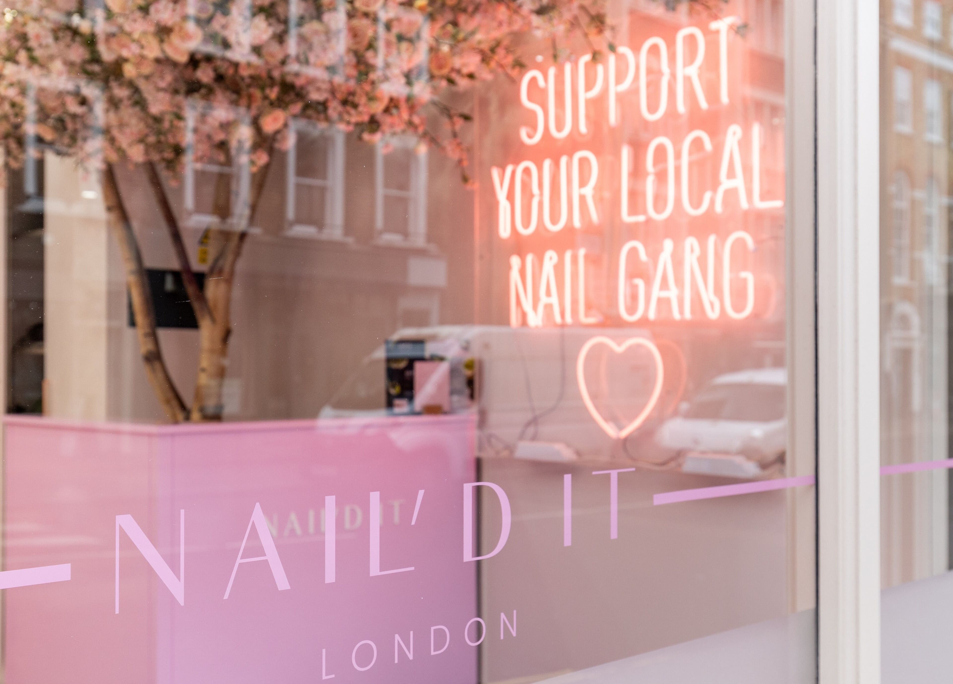 Nail'd It Marylebone entrance with neon sign in London, England, GB.