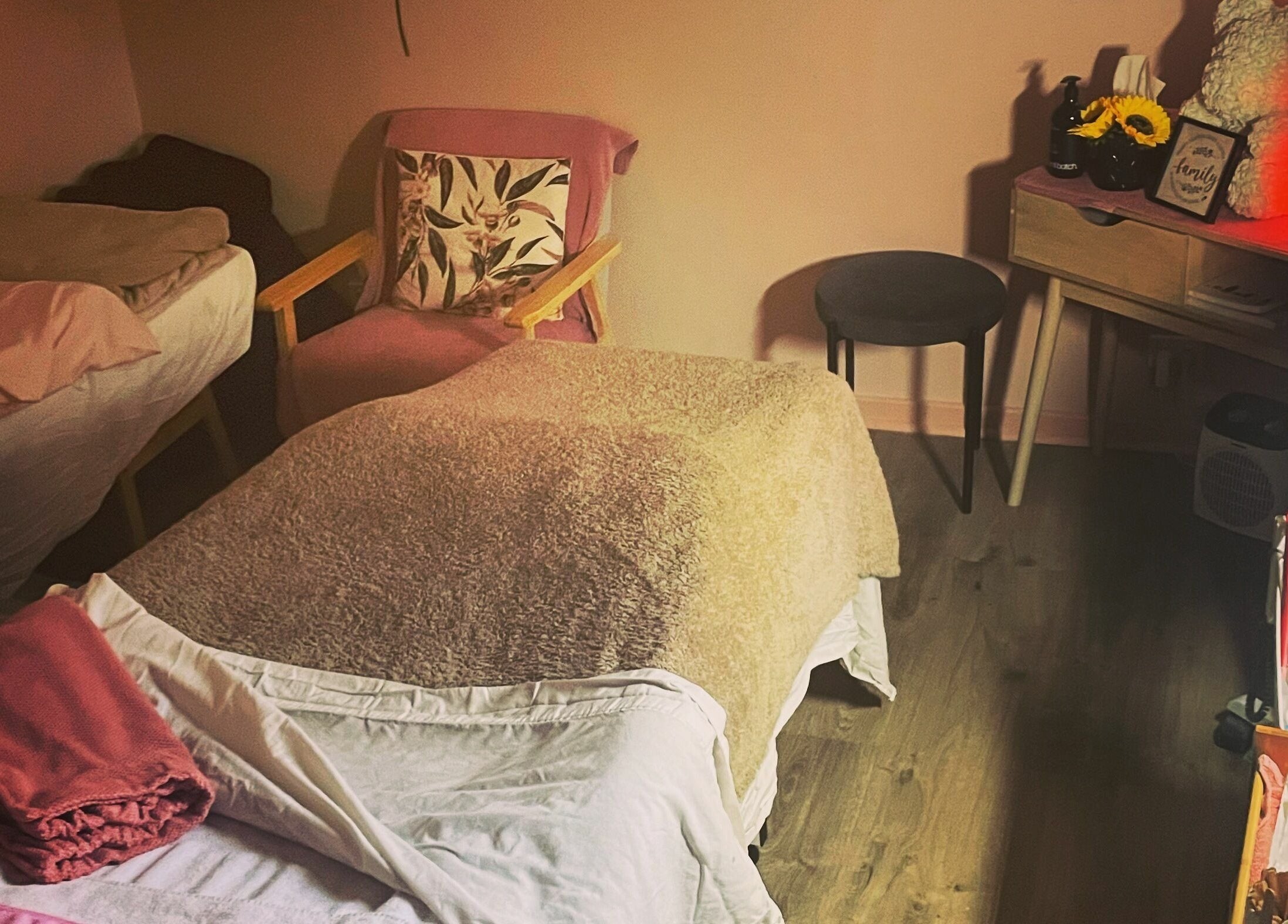 Relaxing treatment room at Kalgoorlie Beauty, Kalgoorlie, Western Australia, AU with gentle lighting and plush decor.