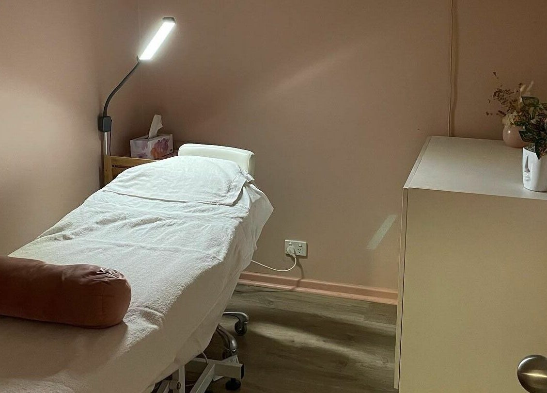 Cozy treatment room at Kalgoorlie Beauty, Kalgoorlie, Western Australia, AU, featuring a massage table and soft lighting.
