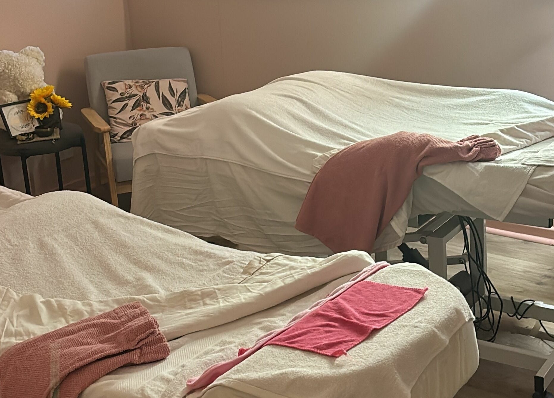 Relaxing treatment room in Kalgoorlie Beauty, Kalgoorlie, Western Australia, AU featuring two massage tables.
