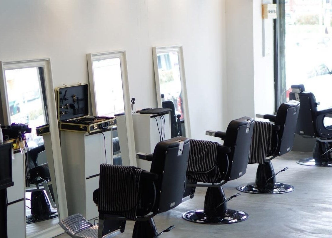 Interior view of Downsouth Barbershop Setia Tropika, Johor Bahru, Johor, MY, featuring stylish barber chairs.