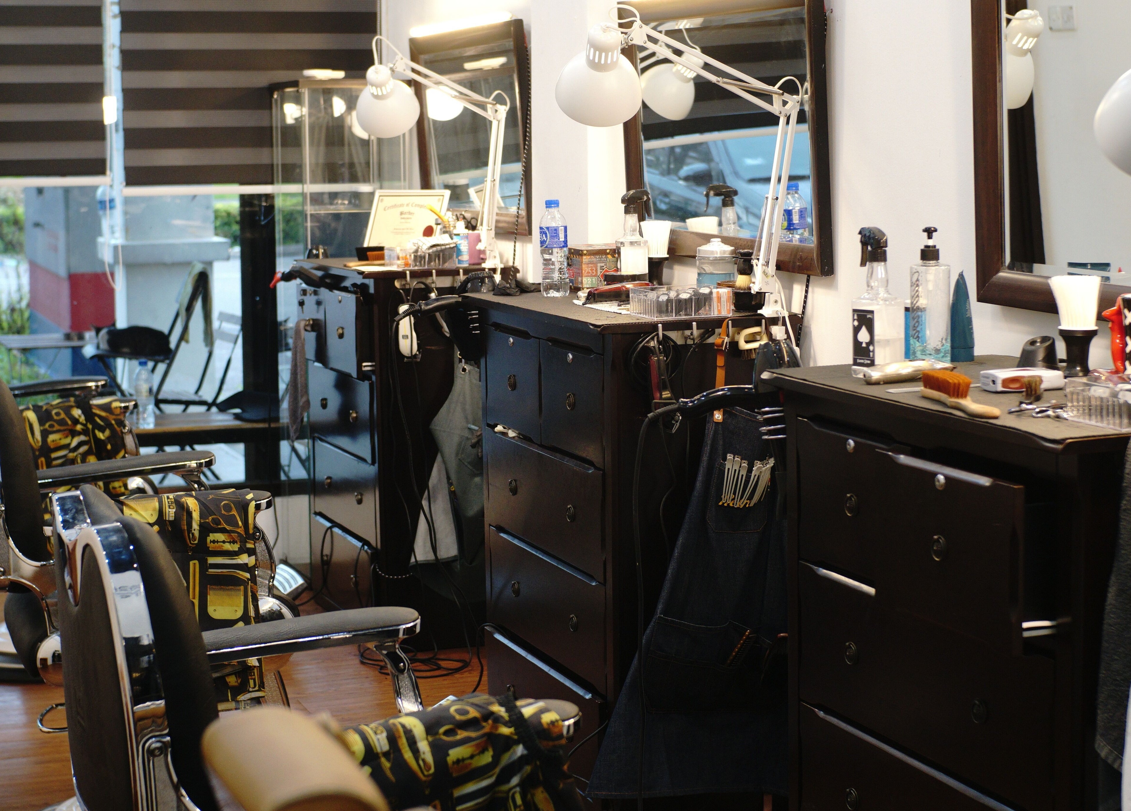 Interior of Downsouth Barbershop Setia Tropika in Johor Bahru, Johor, MY with modern barber chairs and equipment.