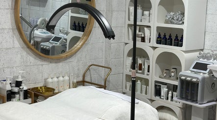 Tranquil treatment room at Bella Perfection Salon, Eglinton, Western Australia, AU with modern equipment.