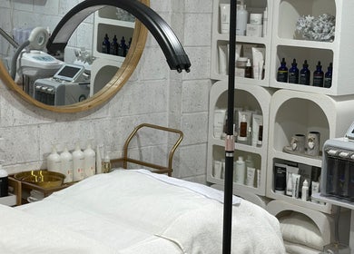 Elegant treatment room at Bella Perfection Salon, Eglinton, Western Australia, AU featuring advanced skincare equipment.