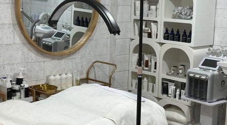 Elegant treatment room at Bella Perfection Salon, Eglinton, Western Australia, AU featuring advanced skincare equipment.