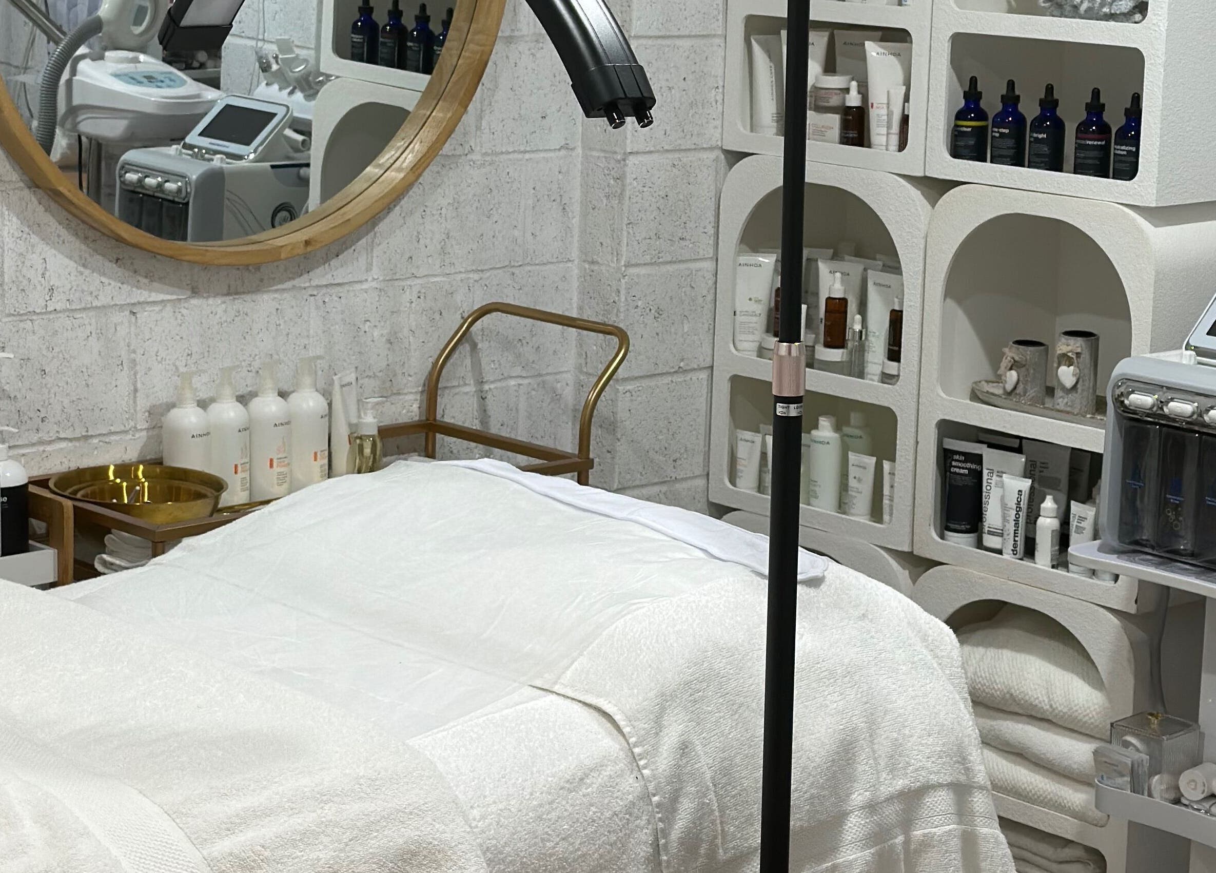 Relaxing treatment room at Bella Perfection Salon in Eglinton, Western Australia, AU with modern equipment and decor.