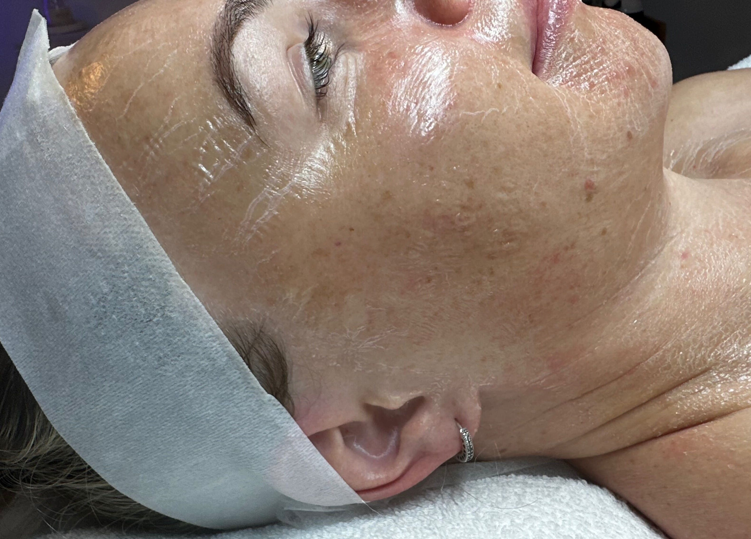 Facial treatment at Bella Perfection Salon, Eglinton, Western Australia, AU showcases a serene skincare session.