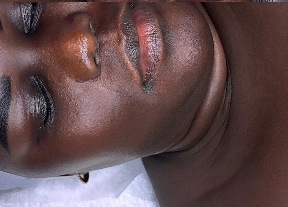 Relaxed client enjoying facial at Bella Perfection Salon, Eglinton, Western Australia, AU.