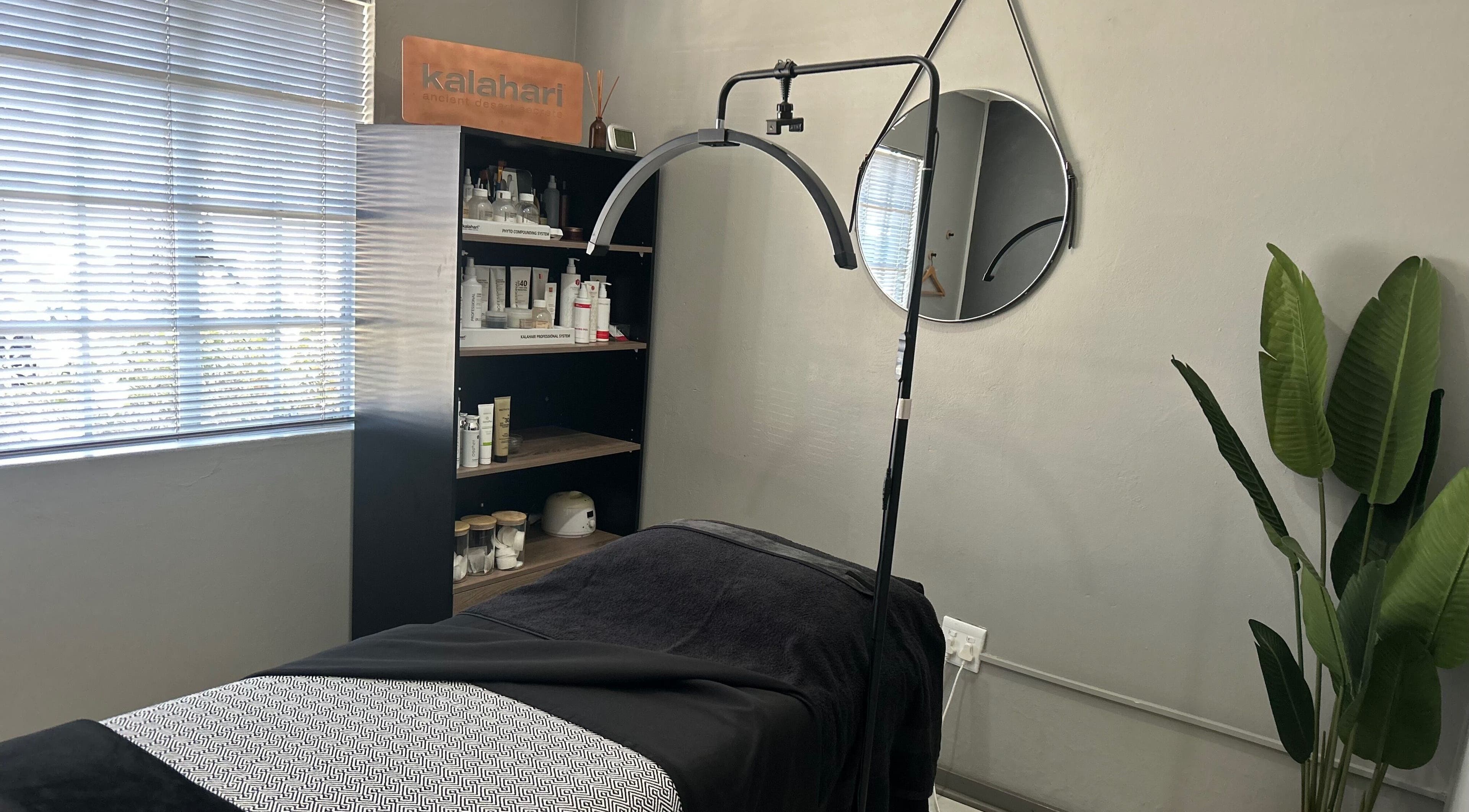 Relaxing treatment room at BeauVie Beauty Bar in Benoni, Gauteng, ZA with modern decor and natural light.