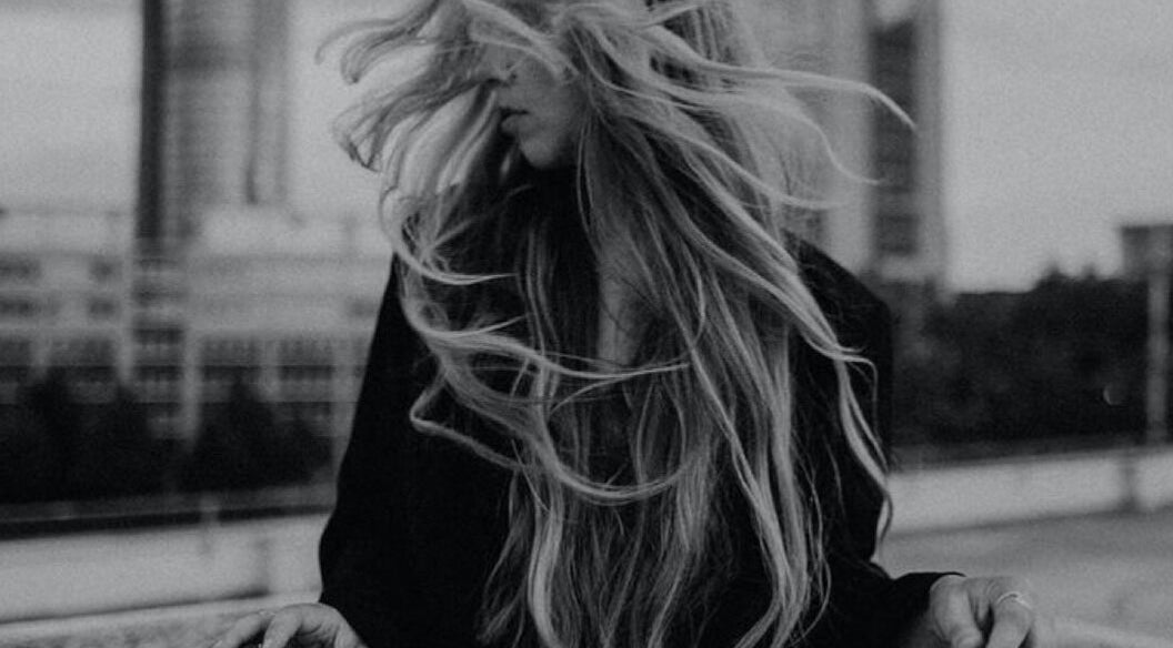 Wind-blown hair showcasing style at SO Natural Extensions, Epsom, England, GB.