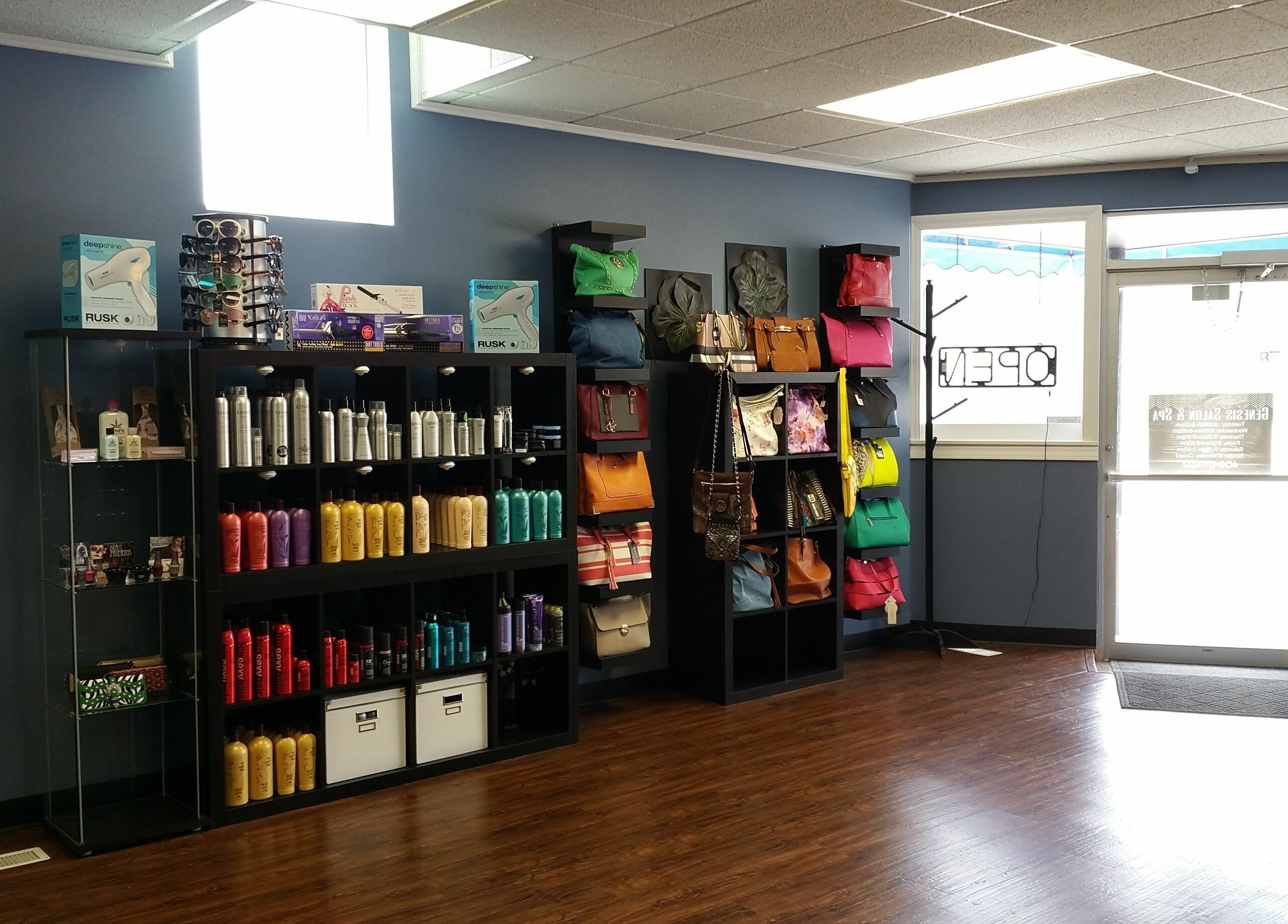 Stylish interior of Genesis Salon and Spa showcasing beauty products and handbags in Boscobel, Wisconsin, US.