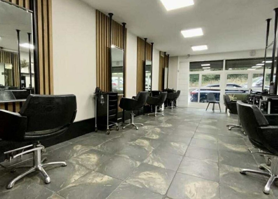 Interior of ML Studio in Pontefract, England, GB featuring modern salon chairs and mirrors.