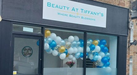 Exterior of Beauty At Tiffanys with festive balloons, Bradford, England, GB.