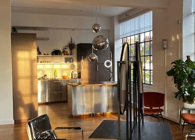 Modern interior of Studio 90 in London, England, GB, featuring stylish decor with natural light and elegant furnishings.