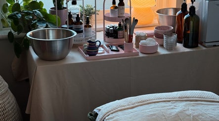 Aceso Healing Therapies' serene setup with wellness tools, Margate, England, GB. Inviting and calming space.